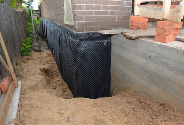 SJ Waterproofing Pros technician performing targeted Emergency Waterproofing assessment in Rahway, NJ